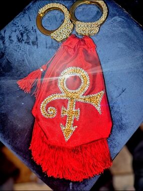 Red Satin Tassel Bag with Gold Rhinestone Symbol & Genuine Handcuff Handles